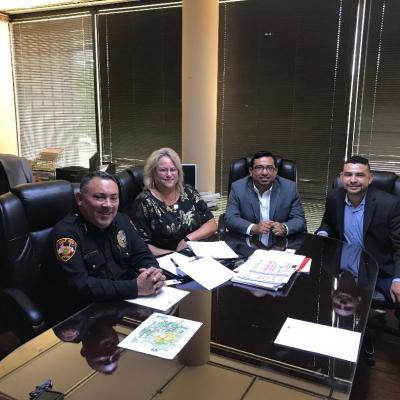 Lupe Negrete & Cynthia Aulds with Eagle Pass Police Chief A. Guajardo & Asst. City Mgr. Ivan Morua